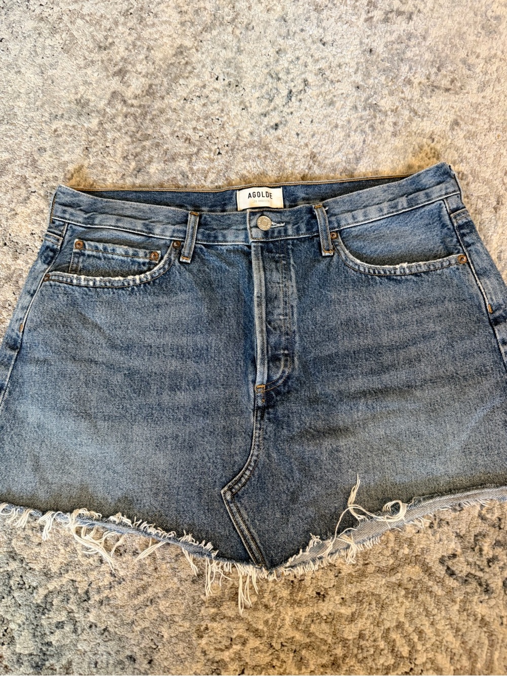 Agolde Faded Blue Denim Cutoff Shorts with Raw Hem